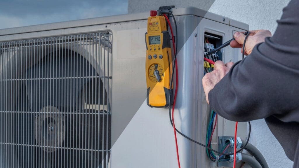 Worker checking furnace wattages